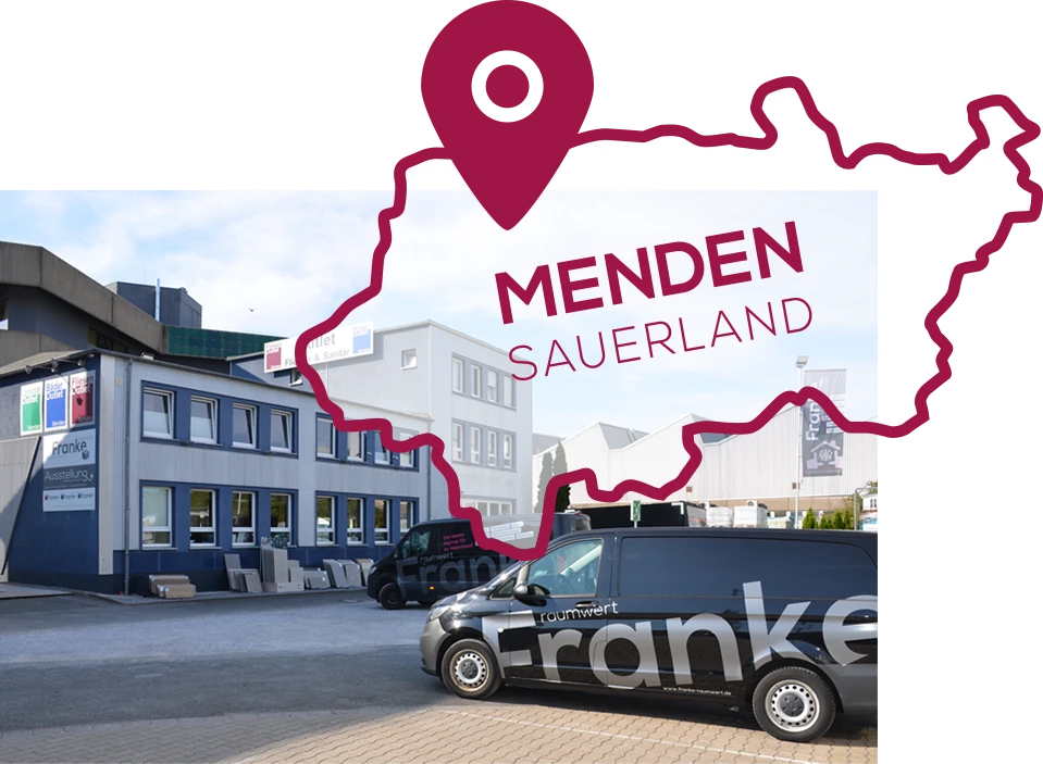 Gebäude der Fliesenausstellung Franke Raumwert mit einem Umriss des Sauerlands beschriftet mit Menden Sauerland.