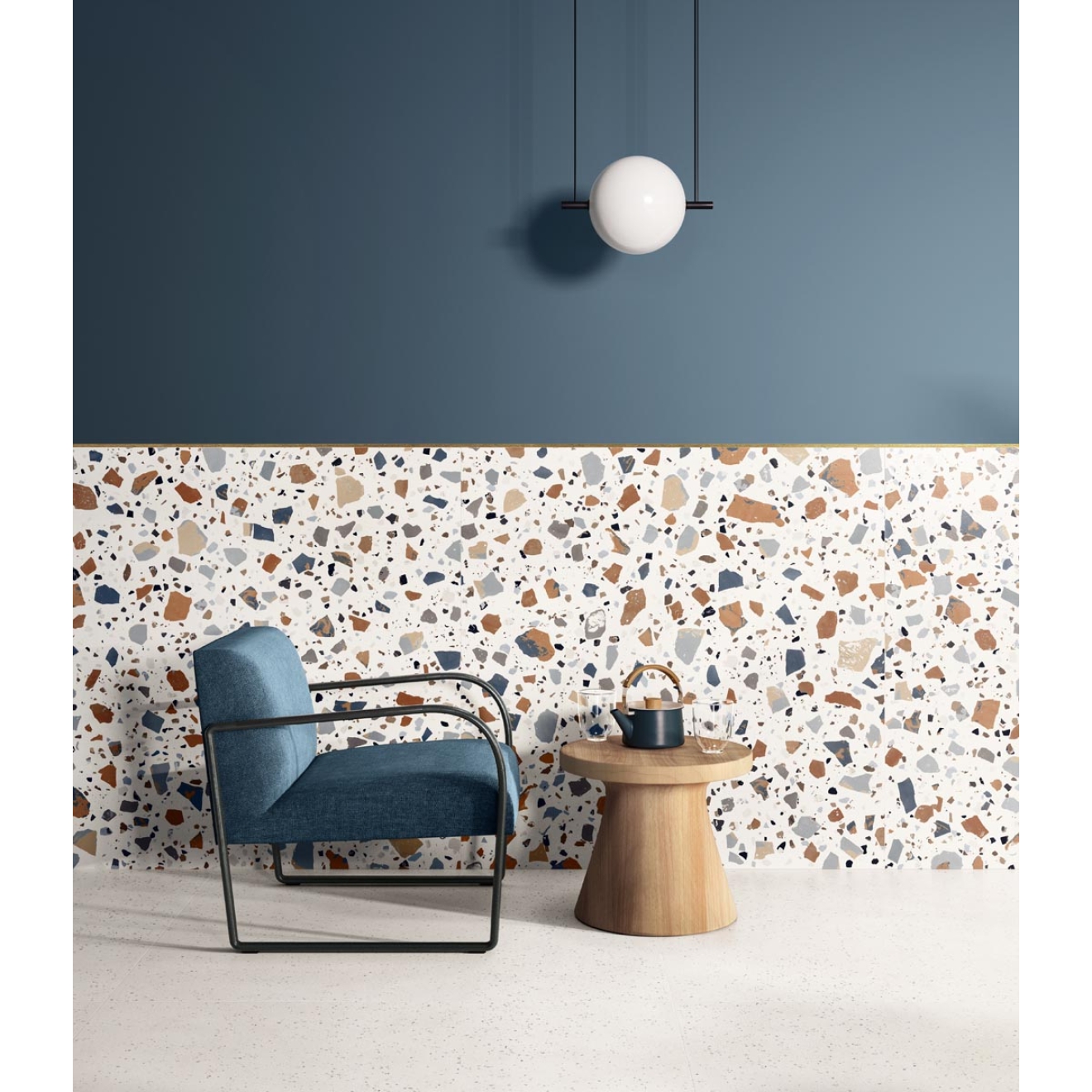 Fliese Sant Agostino Deconcrete in der Farbe De-Micro White verlegt hinter einem Sessel