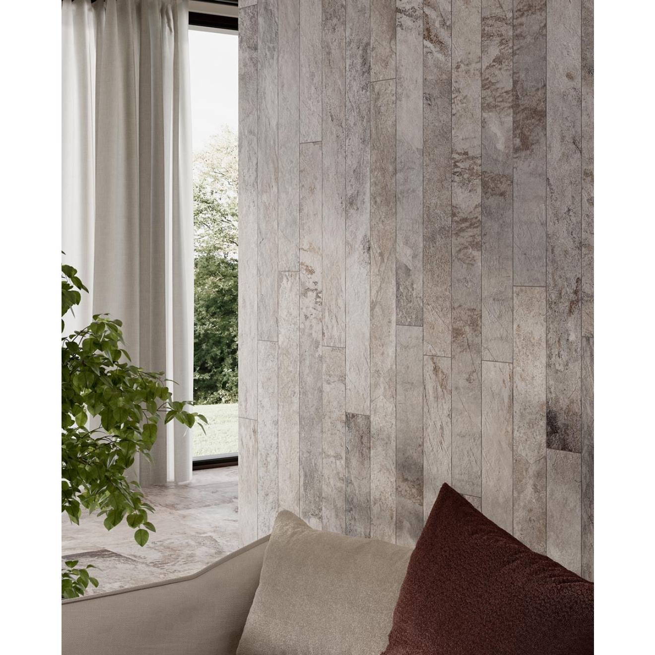 Fliese Sant Agostino Metastone in der Farbe Mud verlegt hinter einem Sofa