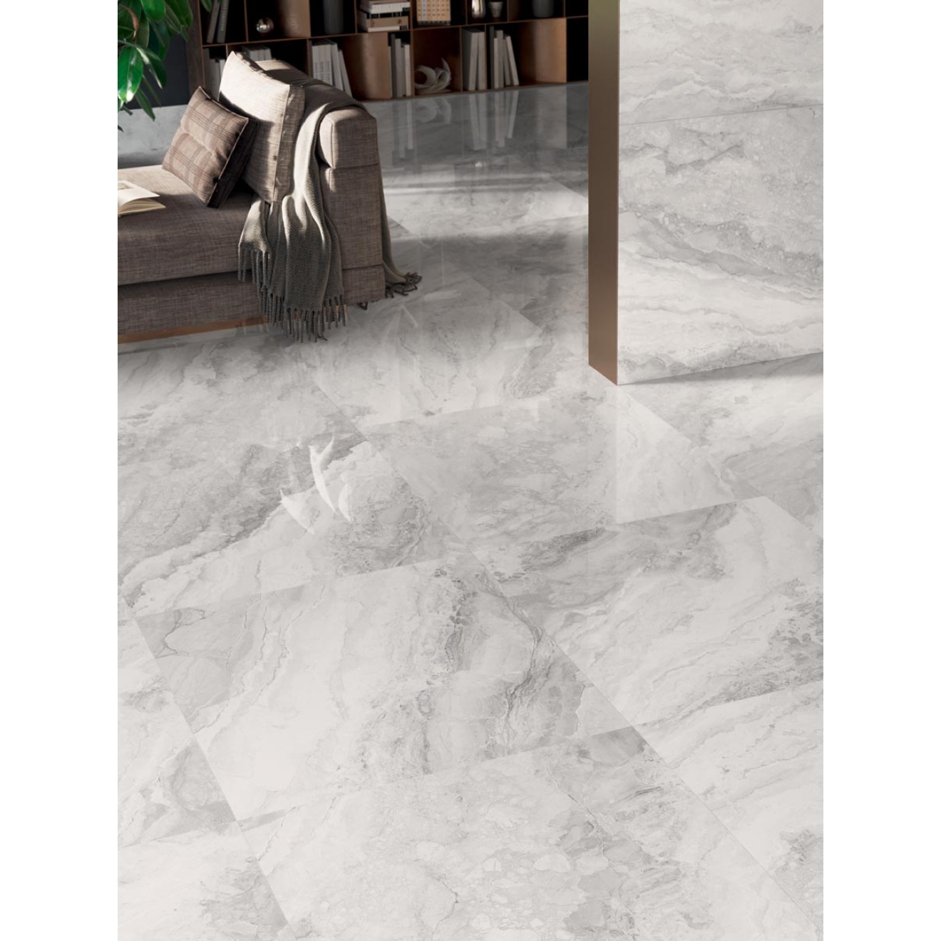 Fliese Sant Agostino in der Farbe Pearl verlegt unter einem Sofa