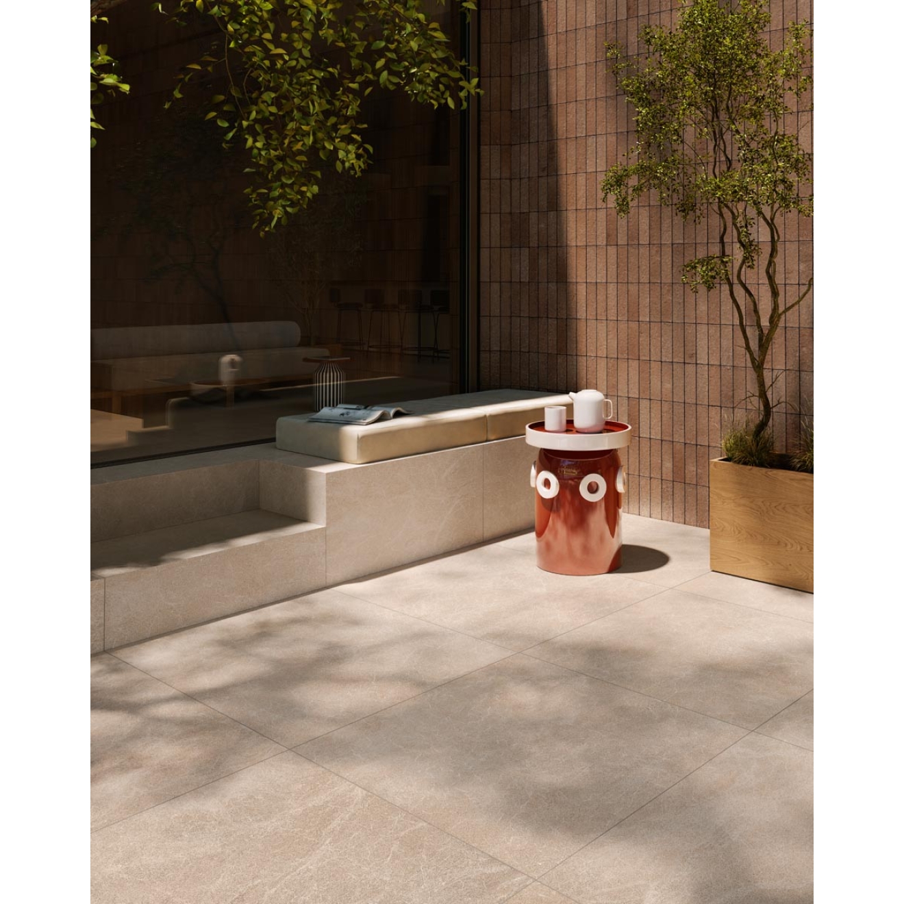 Fliese Sant Agostino Unionstone 2 in der Farbe Oriental Beige verlegt auf einer Terrasse