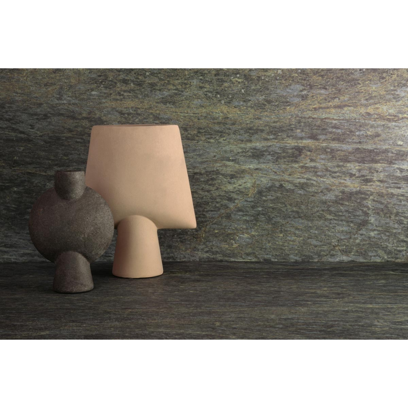 Fliese Sant Agostino Unionstone 2 in der Farbe Serpentino verlegt hinter Dekorationen