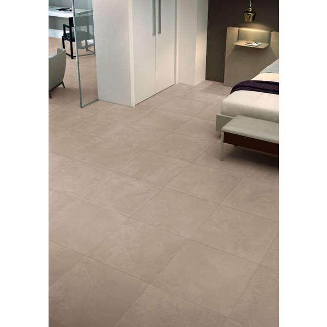 Fliese Keope Moov in der Farbe Beige verlegt unter einem Bett