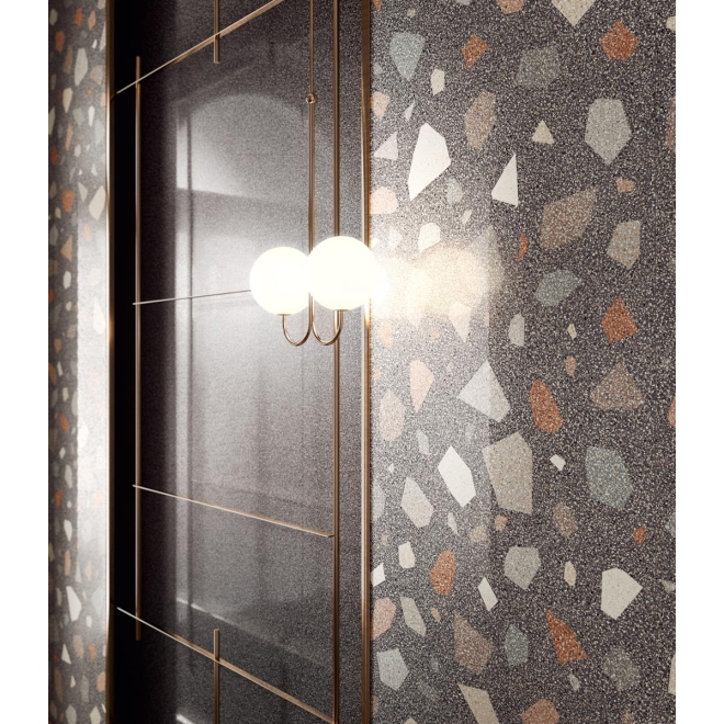 Fliese Sant Agostino Newdeco in der Farbe Palladian Dark verlegt hinter einer Lampe