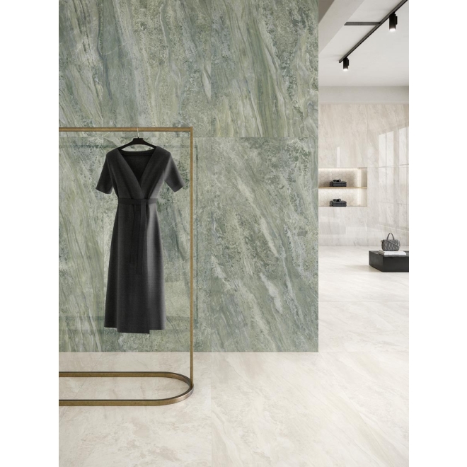 Fliese Sant Agostino Paradiso in der Farbe Ivory verlegt unter einer Kleiderstange