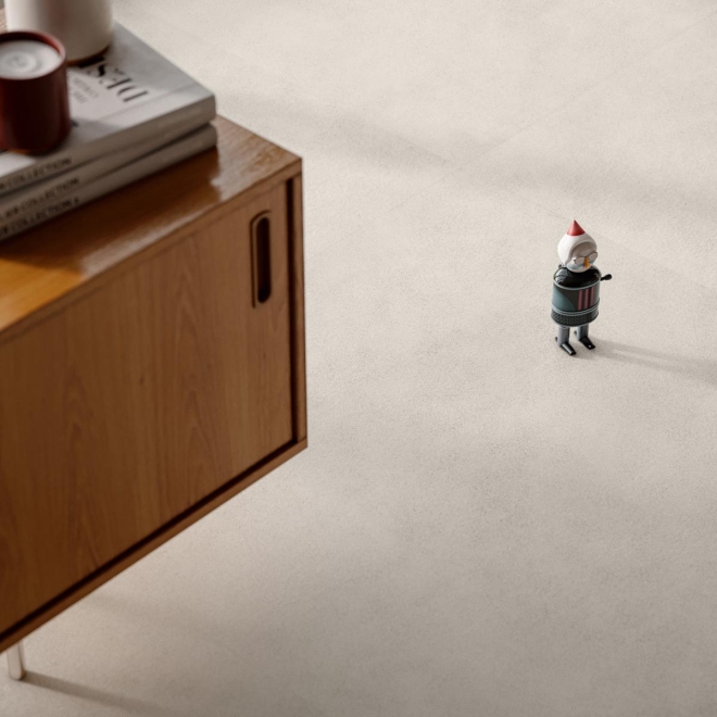 Fliese Sant Agostino Sable in der Farbe Light verlegt unter einem Schrank