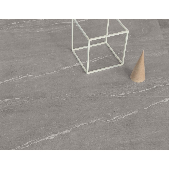 Fliese Sant Agostino Waystone in der Farbe Grey verlegt unter einem Würfel