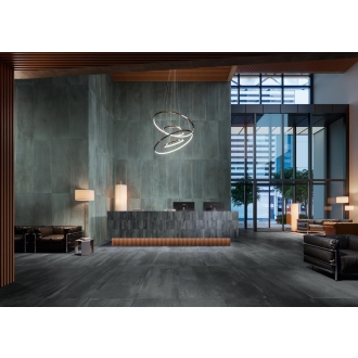 Fliese Sant Agostino Dripart in der Farbe Calamine verlegt in einem Hoteleingang