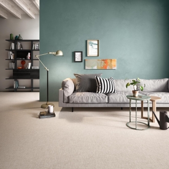 Fliese Sant Agostino Fineart in der Farbe Sand verlegt in einem Wohnzimmer