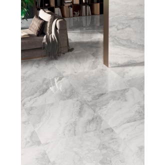 Fliese Sant Agostino in der Farbe Pearl verlegt unter einem Sofa