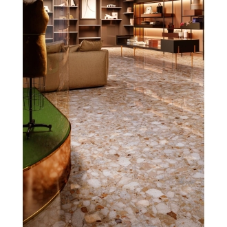 Fliese Sant Agostino Venistone in der Farbe Gold verlegt unter einem Sofa